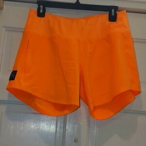 Oiselle Long Roga 6" orange running shorts